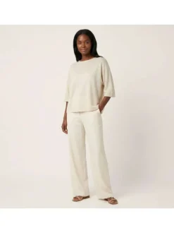 Pull beige uni pourvu d'une coupe ample et de manches courtes