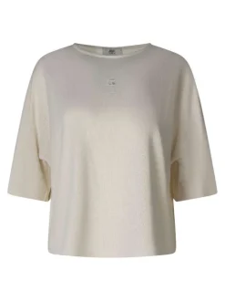 Pull beige uni pourvu d'une coupe ample et de manches courtes