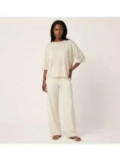 Pull beige uni pourvu d'une coupe ample et de manches courtes