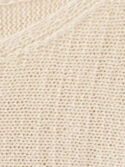 Pull beige uni pourvu d'une coupe droite et de manches longues