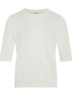 Pull blanc à motifs avec une coupe droite et des manches courtes