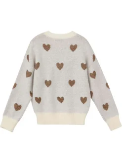 Pull blanc à motifs coeurs avec une coupe droite et un col rond