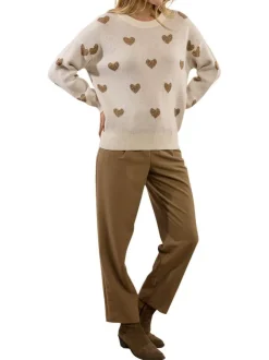 Pull blanc à motifs coeurs avec une coupe droite et un col rond