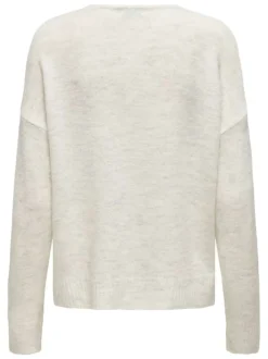 Pull blanc uni avec une coupe droite et des manches longues