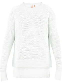 Pull blanc uni en maille ajourée avec une coupe droite et un col rond