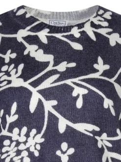 Pull bleu et écru à imprimé floral avec un col rond et des manches longues