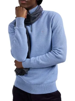 Pull bleu uni droit avec un col camionneur zippé et à manches longues
