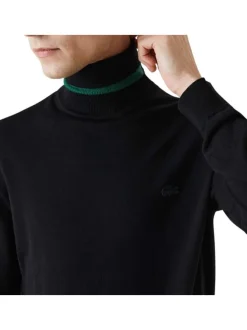 Pull col roulé en laine noir avec crocodile brodé à la poitrine gauche