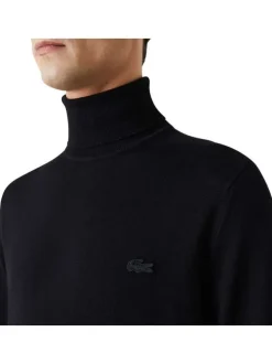 Pull col roulé en laine noir avec crocodile brodé à la poitrine gauche