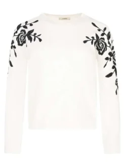 Pull couleur écru, brodé avec un col rond et des manches longues