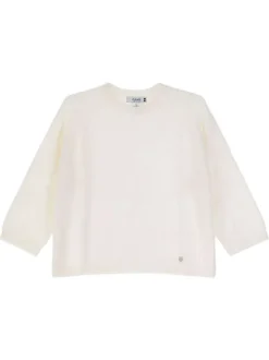 Pull écru en maille fine avec une coupe droite et un col rond