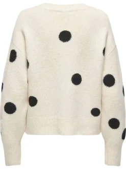 Pull écru à gros pois avec une coupe droite et un col rond