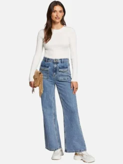 Pull écru uni avec une coupe ajustée, un col rond et zip à l'épaule
