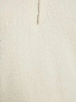 Pull écru uni avec une coupe droite à col montant et une fermeture zippée