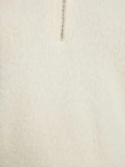 Pull écru uni avec une coupe droite à col montant et une fermeture zippée