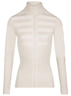 Pull écru uni avec une coupe slim à col roulé et à manches longues