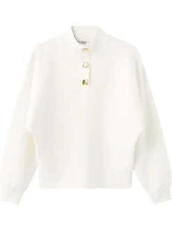 Pull écru uni en maille avec une coupe ample et des manches longues