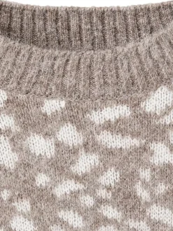 Pull écru uni pourvu d'un col v côtelé et de manches longues
