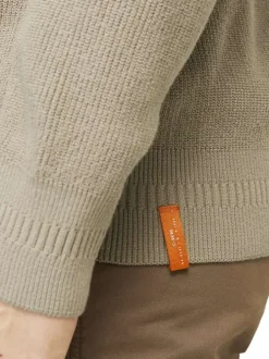 Pull en coton beige côtelé à coupe droite et col montant et zippé resserré