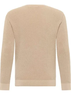 Pull en coton beige uni avec un col rond et des manches longues