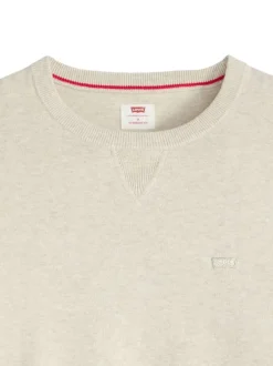 Pull en coton beige uni avec un col rond et des manches longues