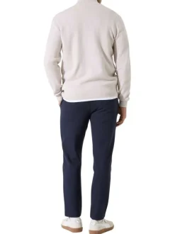 Pull en coton beige uni avec un col zippé et des manches longues