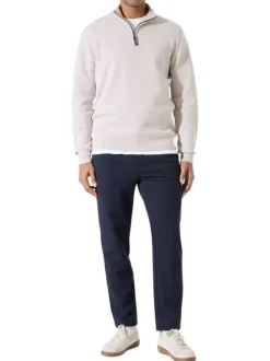 Pull en coton beige uni avec un col zippé et des manches longues