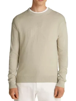 Pull en coton beige uni avec une coupe droite et logo embossé