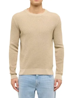 Pull en coton beige uni avec une coupe droite et un col rond