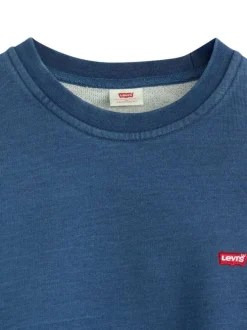 Pull en coton bleu à coupe droite effet délavé pourvu d'un col rond