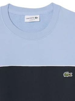 Pull en coton bleu à coupe droite pourvu d'un col rond en maille piquée