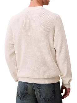 Pull en coton écru à maille effet gaufrée avec un col rond et coupe droite