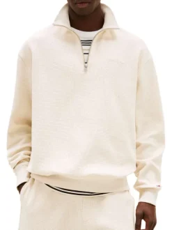 Pull en coton écru uni aspect gaufré avec un col camionneur et le logo brodé