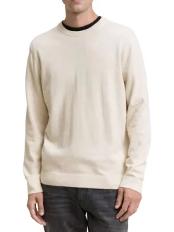 Pull en coton écru uni avec un col rond et des manches longues