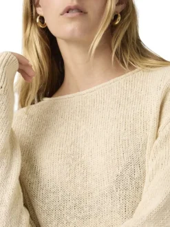Pull en coton écru uni avec une coupe droite et un col rond