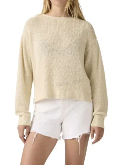 Pull en coton écru uni avec une coupe droite et un col rond