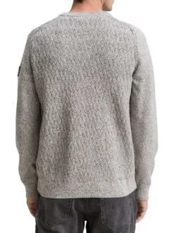 Pull en coton gris clair moucheté avec un col rond et des manches longues
