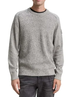 Pull en coton gris clair moucheté avec un col rond et des manches longues