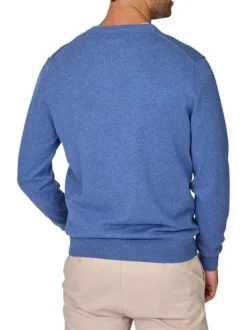 Pull en coton indigo uni avec une coupe droite à col v et logo iconique