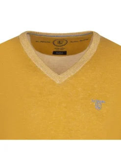 Pull en coton jaune uni avec logo de la marque et une coupe droite