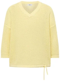 Pull en coton jaune uni pourvu d'un cordon de serrage et de manches longues