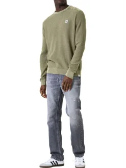 Pull en coton kaki uni en maille tricotée avec patch de la marque