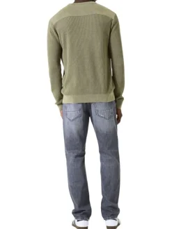 Pull en coton kaki uni en maille tricotée avec patch de la marque