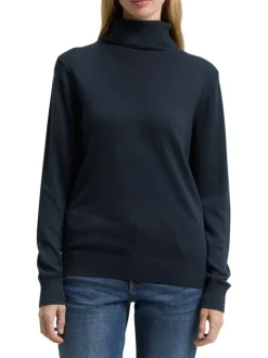 Pull en coton marine uni avec un col roulé et des manches longues