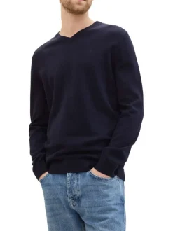 Pull en coton marine uni avec une coupe droite et un col en V