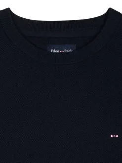 Pull en coton marine uni avec une coupe droite et un col rond
