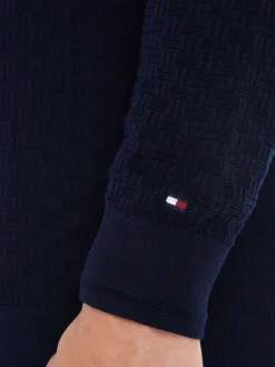 Pull en coton marine uni en maille croisée avec une coupe droite et un col rond