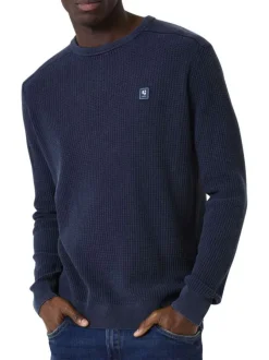 Pull en coton marine uni en maille tricotée avec patch de la marque