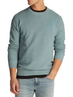 Pull en coton mélangé bleu uni avec une coupe droite et un col rond