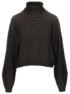 Pull en coton mélangé sapin uni avec une coupe évasée, un col roulé et à manches longues